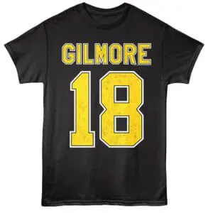 Custom Gilmore sports tee with bold yellow and black lettering, perfect for fans of vintage sports apparel.