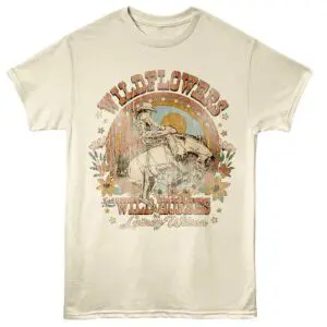 Vintage-inspired Wildflowers T-shirt featuring a cowboy riding a horse with floral accents.