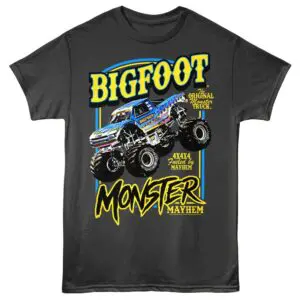 Bold graphic of Bigfoot monster truck with vibrant colors on black shirt.