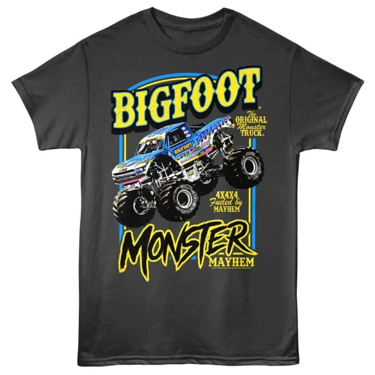 Bold graphic of Bigfoot monster truck with vibrant colors on black shirt.