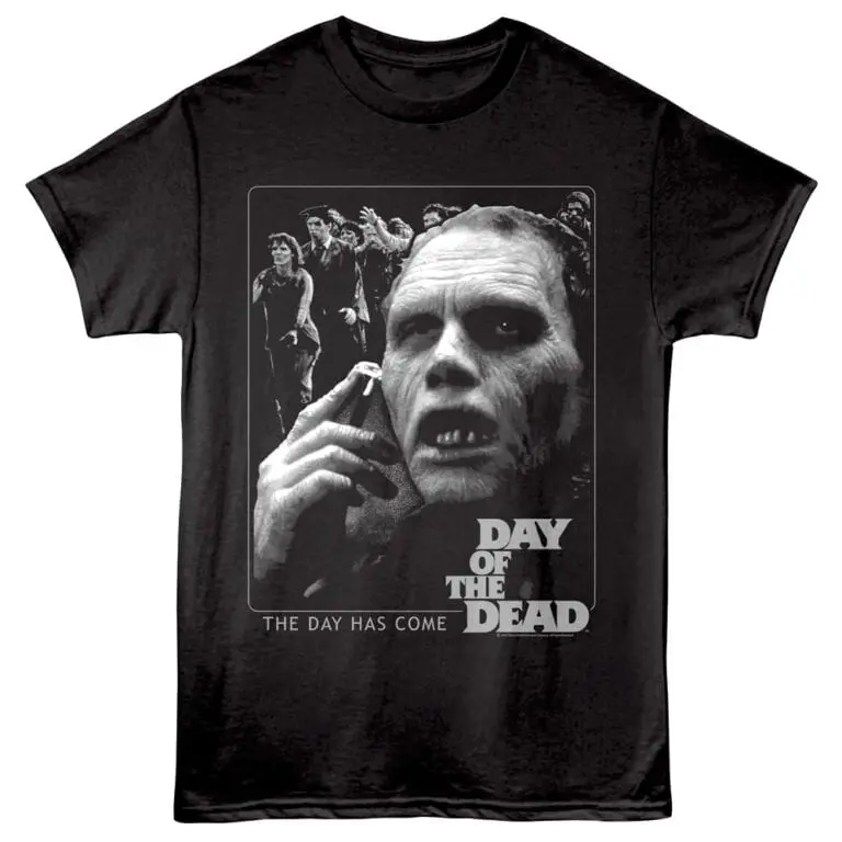 Zombie horror movie graphic tee with creepy undead character and "Day of the Dead" slogan.