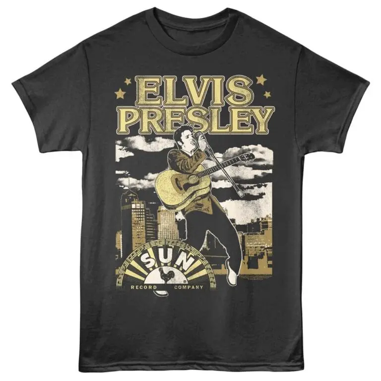 Elvis Presley vintage concert T-shirt featuring city skyline and music theme, perfect for rock & roll fans.