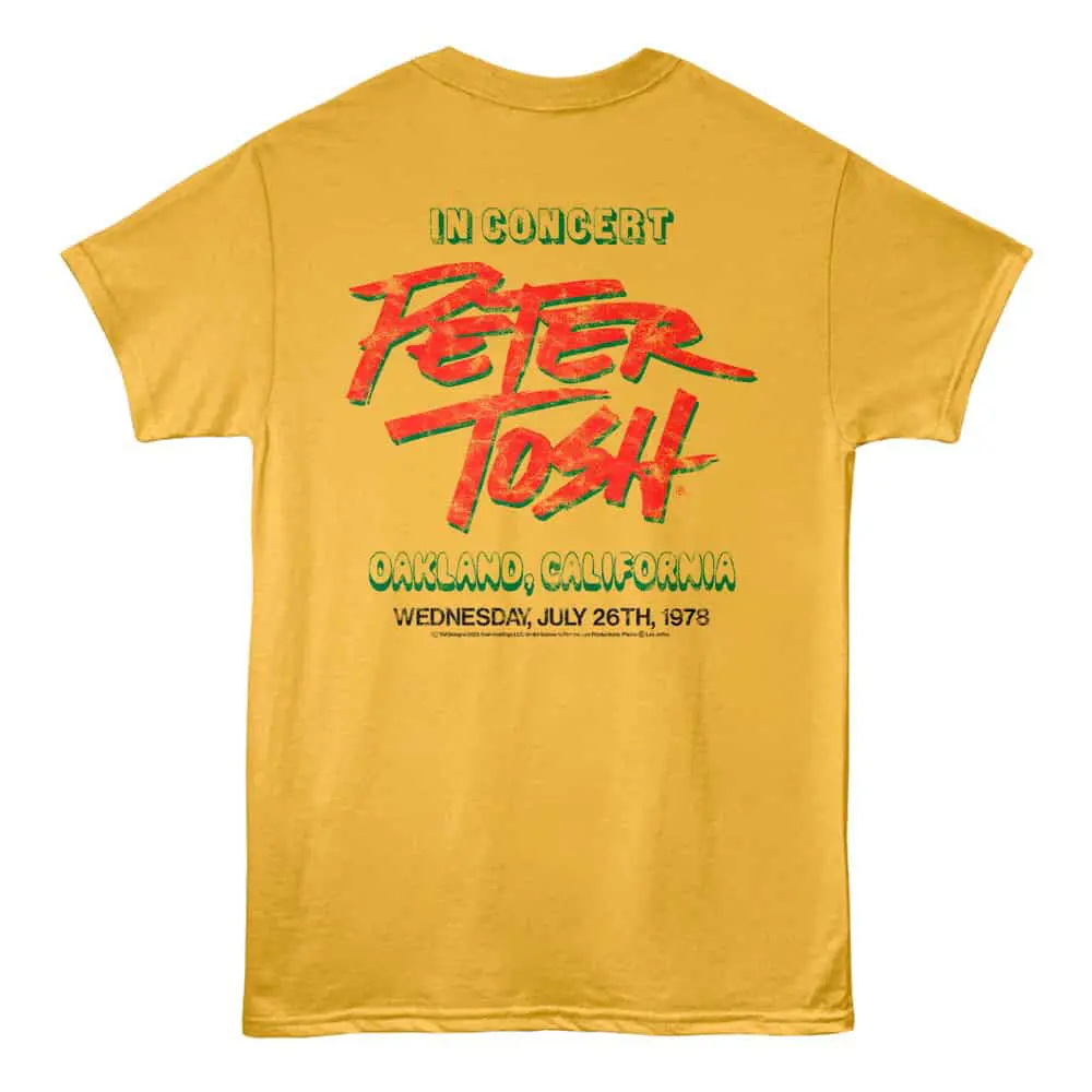Vintage yellow concert t-shirt for Peter Tosh Oakland, California 1978 event.