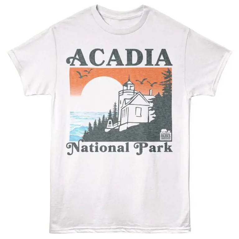 Bright graphic T-shirt featuring Acadia National Park sunset scene, lighthouse, and nature design.