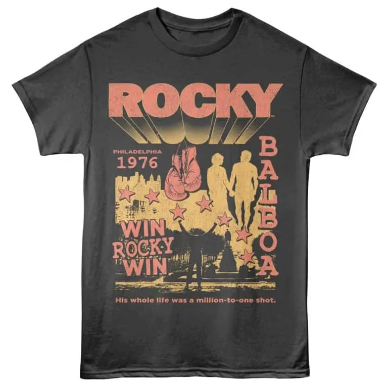 Rocky movie-themed T-shirt with vintage Philadelphia 1976 design, featuring boxing gloves, city skyline, and inspirational text.