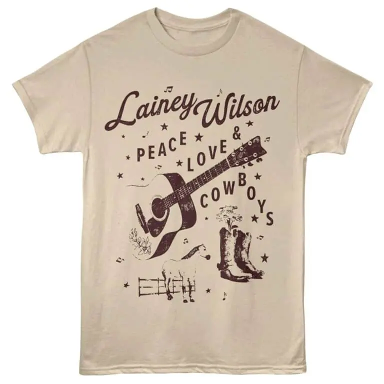 Vintage-inspired Lainey Wilson Tee with guitar, cowboy boots, horse, and floral design.