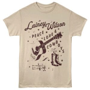Vintage-inspired Lainey Wilson Tee with guitar, cowboy boots, horse, and floral design.