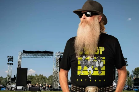 Bearded man wearing a zz top tee