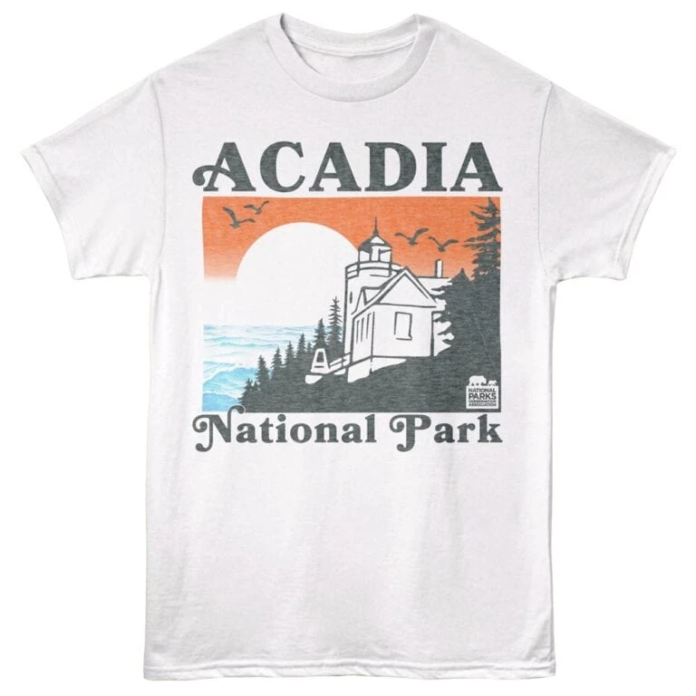 Bright graphic T-shirt featuring Acadia National Park sunset scene, lighthouse, and nature design.