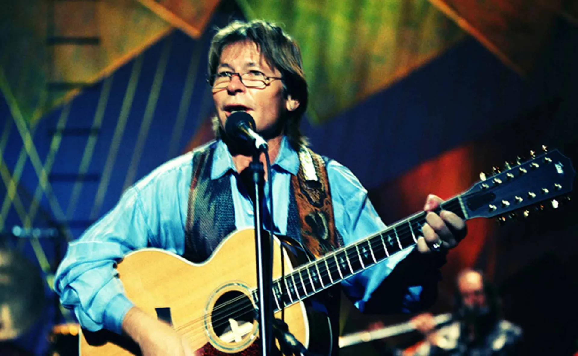 John Denver on stage