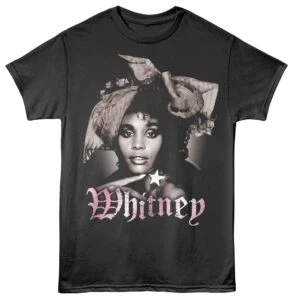 Close-up of Whitney Houston graphic T-shirt featuring her portrait and "Whitney" text in pink, ideal for music fans and streetwear fashion.