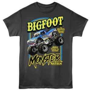 Bold graphic of Bigfoot monster truck with vibrant colors on black shirt.