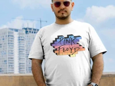 Celebrating pride with a colorful Pink Floyd tribute T-shirt, perfect for LGBTQ+ supporters and music lovers.